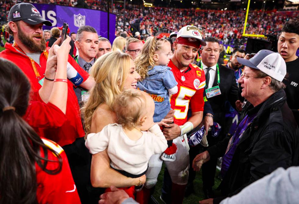 Kansas City Chiefs quarterback Patrick Mahomes (15) celebrates with his family afterwinning Sup ...