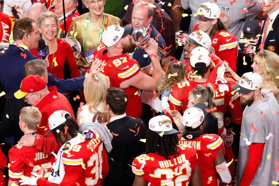 Kansas City Chiefs tight end Travis Kelce (87) kisses the Vince Lombardi trophy after defeating ...