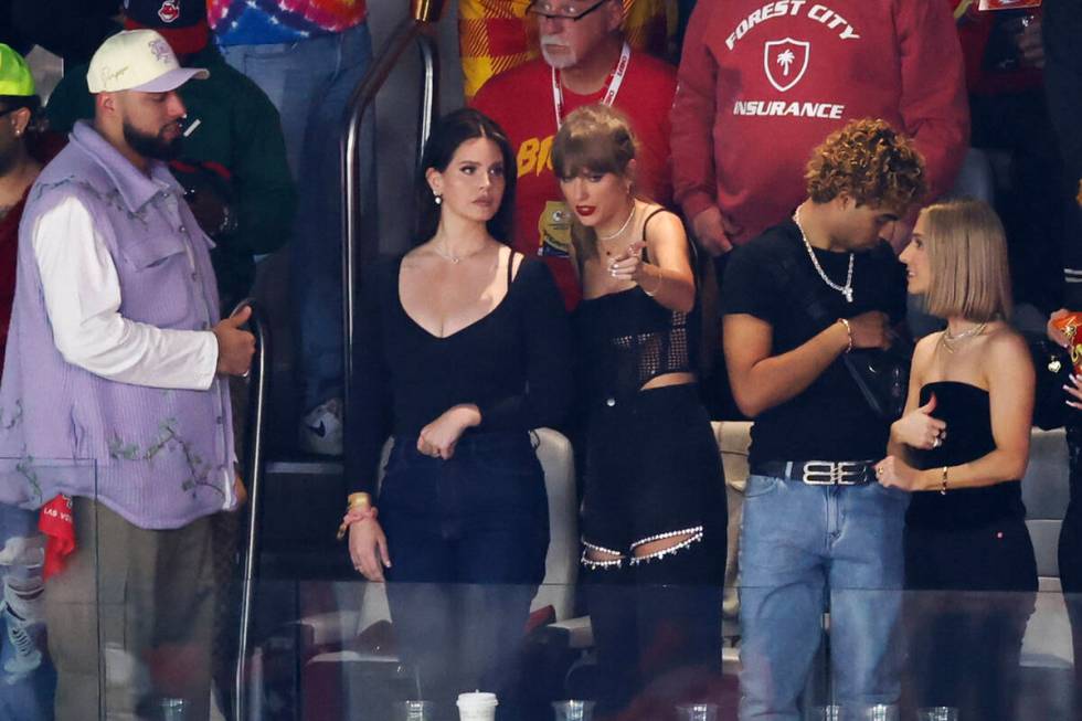 Lana Del Ray and Taylor Swift talk during Super Bowl 58 between the Kansas City Chiefs and the ...