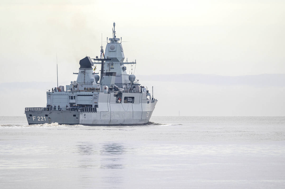 The frigate "Hessen" leaves the port at Wilhelmshaven, Germany, Thursday, Feb. 8, 202 ...