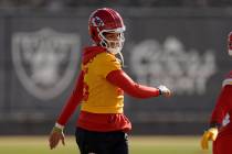 Kansas City Chiefs quarterback Patrick Mahomes (15) runs during practice for Super Bowl 58 Thur ...