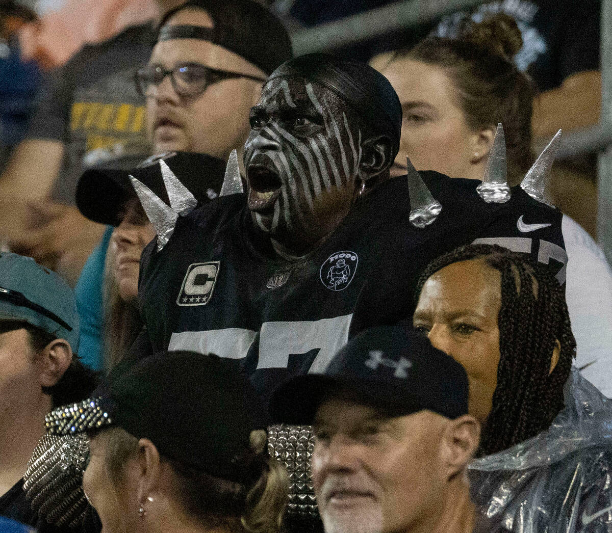 Raiders fan, Wayne Mabry, also known as Violator, reacts to a play during the first half of the ...