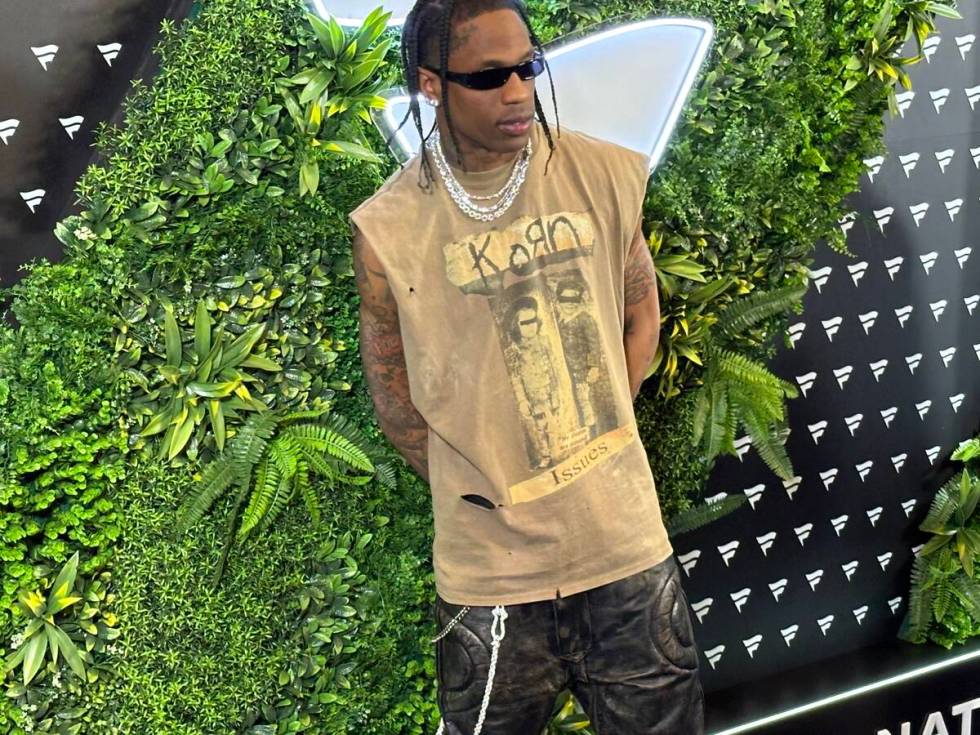 Rapper Travis Scott walks the blue carpet at the Fanatics Super Bowl LVIII Party at Marquee Day ...