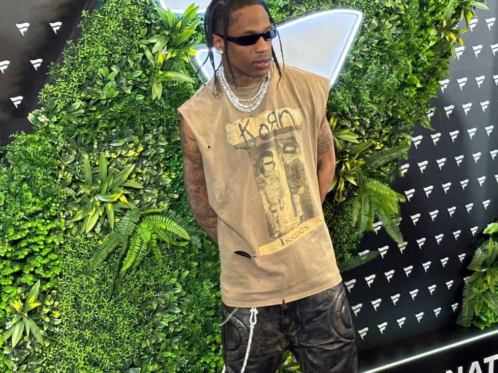 Rapper Travis Scott walks the blue carpet at the Fanatics Super Bowl LVIII Party at Marquee Day ...