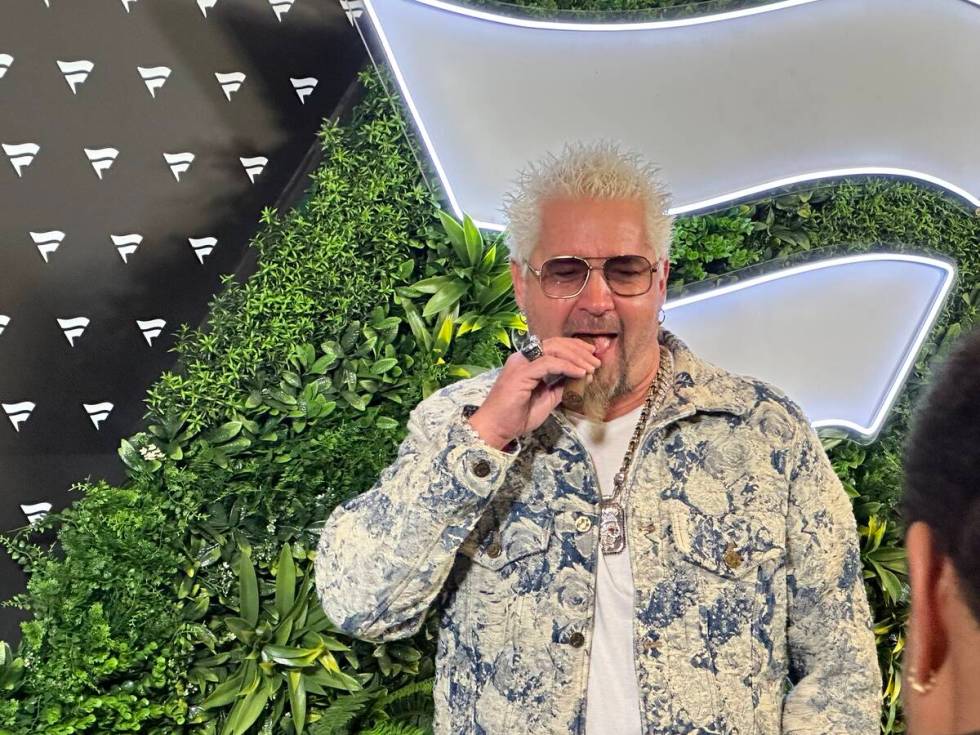 Television personality Guy Fieri walks the blue carpet at the Fanatics Super Bowl LVIII Party ...