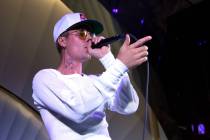 Justin Bieber performs onstage during h.wood Group's grand opening of Delilah at Wynn Las Vega ...