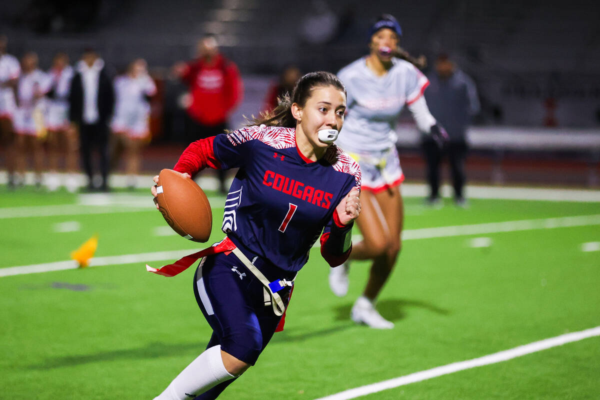 Coronado’s Maci Joncich (1) runs the ball down the field during a flag football game bet ...