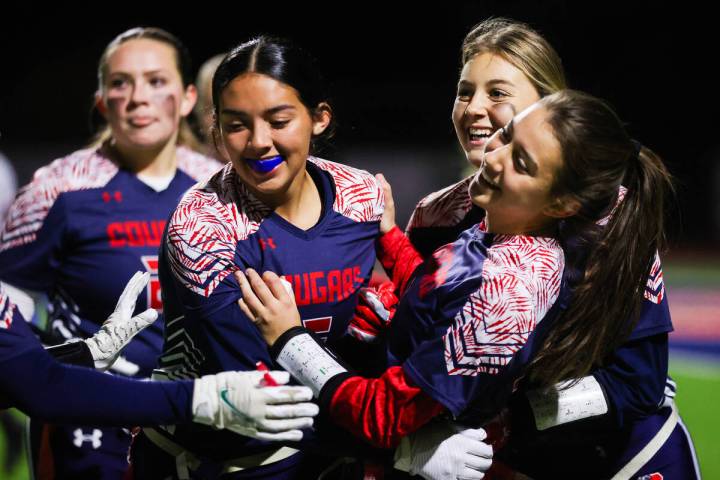 Coronado players celebrate their teammate Maci Joncich’s (1) touchdown during a flag foo ...