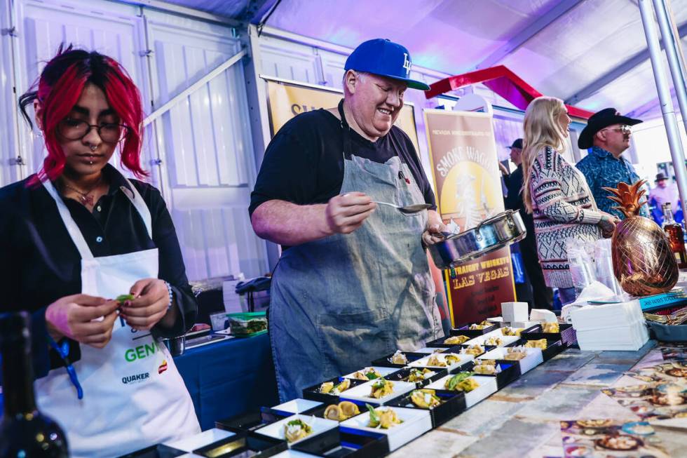 Chef James Trees of Esther’s Kitchen cooks at the Taste of NFL event at the Keep Memory ...
