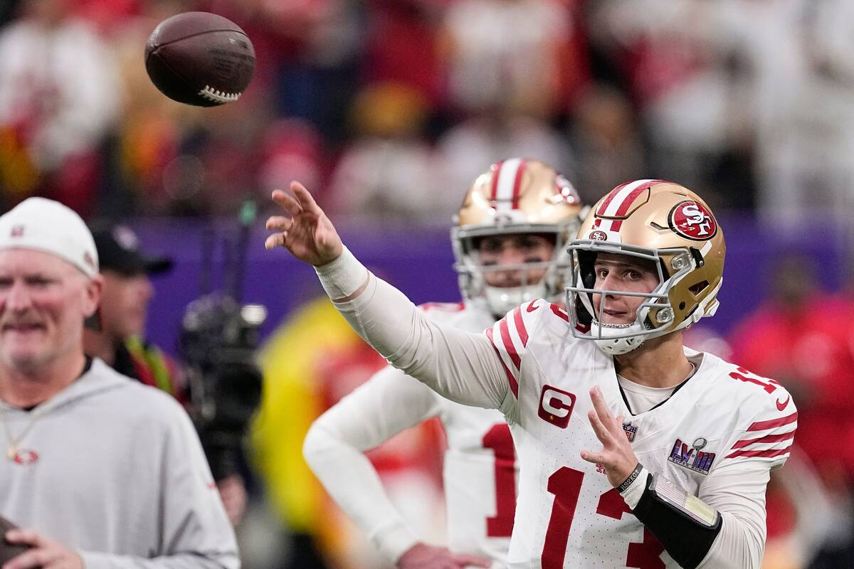 San Francisco 49ers quarterback Brock Purdy warms up before the NFL Super Bowl 58 football game ...