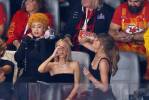 Taylor Swift slams a beer, spreads the cheer in Super Bowl