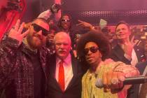 Travis Kelce and Andy Reid pose for a picture with Ludacris at Zouk nightclub at Resorts World ...
