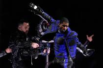 Usher performs during halftime of the NFL Super Bowl 58 football game between the San Francisco ...