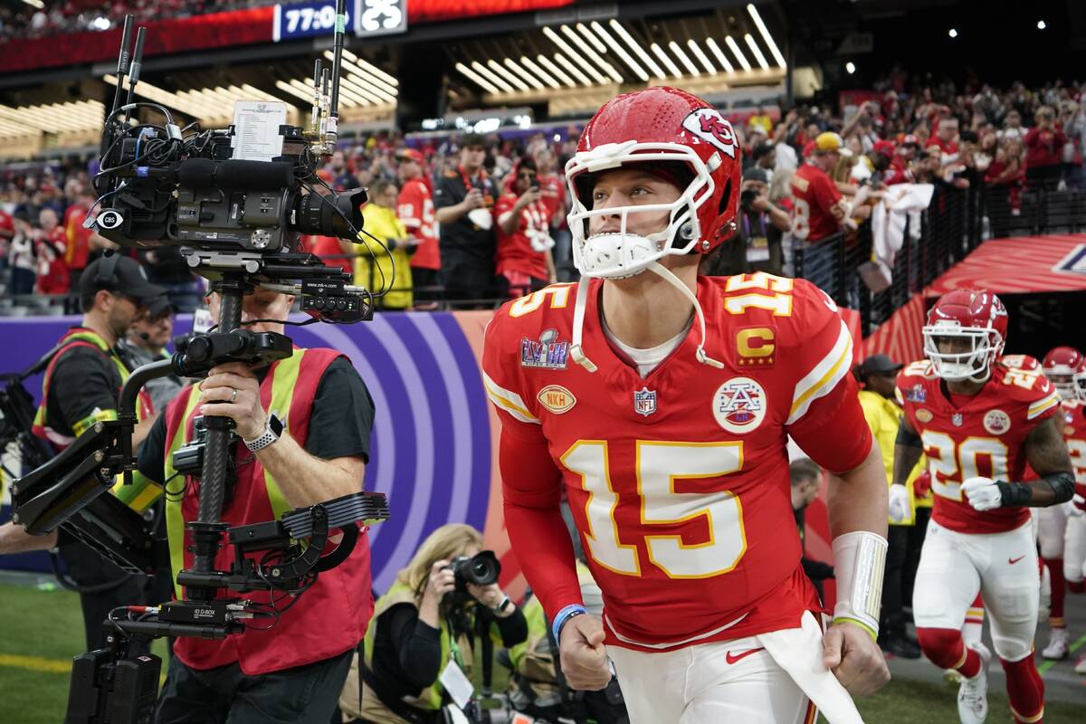 Kansas City Chiefs quarterback Patrick Mahomes takes the field before the NFL Super Bowl 58 foo ...