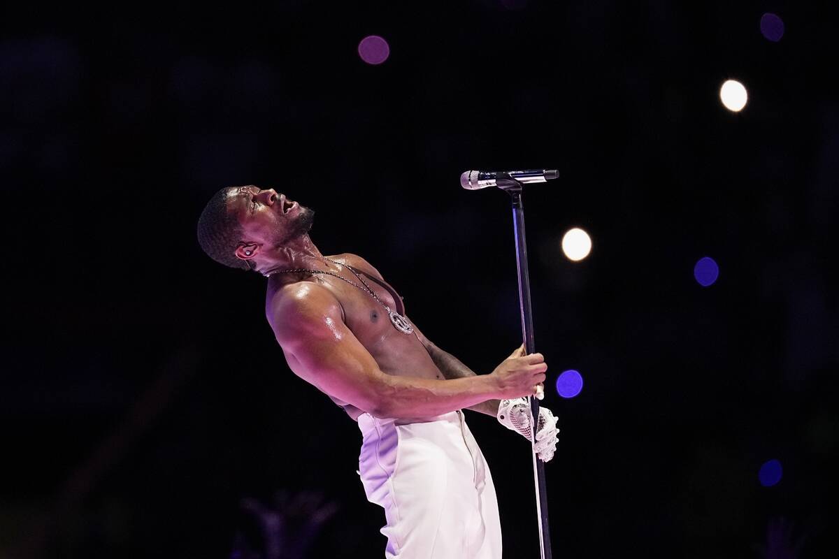 Usher performs during halftime of the NFL Super Bowl 58 football game between the San Francisco ...