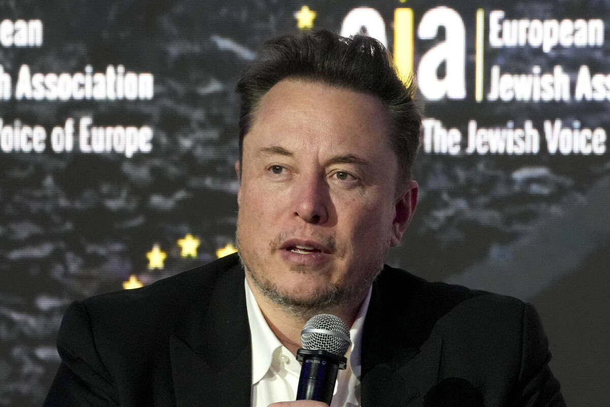 Elon Musk addresses the European Jewish Association's conference in Krakow, Poland, Monday, Jan ...