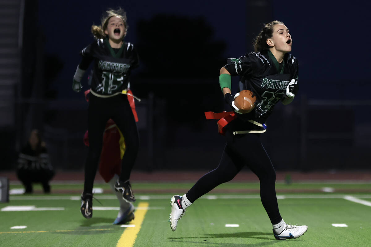 Palo Verde’s Olivia Brown (25) celebrates her touchdown alongside her teammate Alexis Ma ...