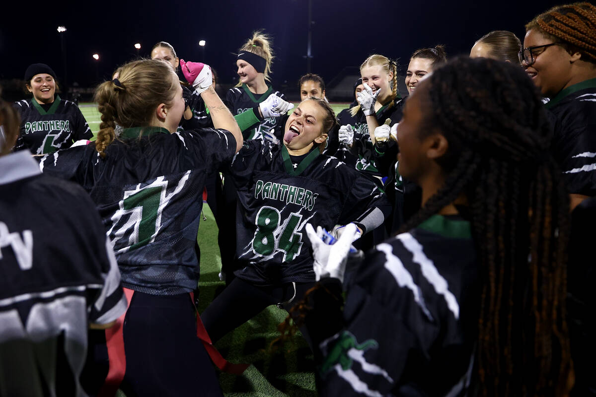 Palo Verde’s Lauren Moses (7) and Taylor Bringhurst (84) dance while celebrating their w ...
