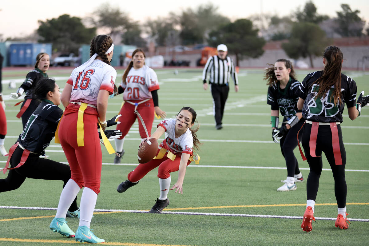 Las Vegas quarterback Sarah Pasquali (6) scores a touchdown during a Class 5A state quarterfina ...