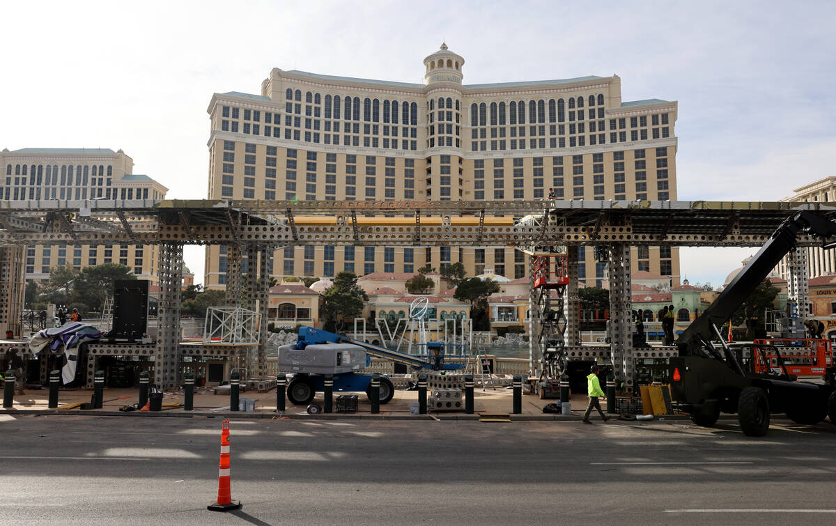 Crews tear down setups from the 2024 Super Bowl at the Bellagio Fountains on the Strip in Las V ...