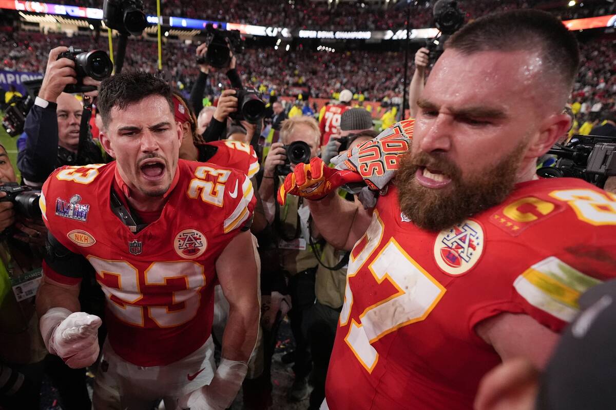 Kansas City Chiefs tight end Travis Kelce (87) and Kansas City Chiefs linebacker Drue Tranquill ...