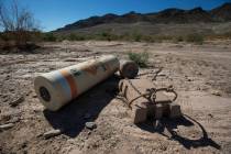 A buoy is seen high and dry near the defunct Echo Bay Marina at Lake Mead National Recreation o ...