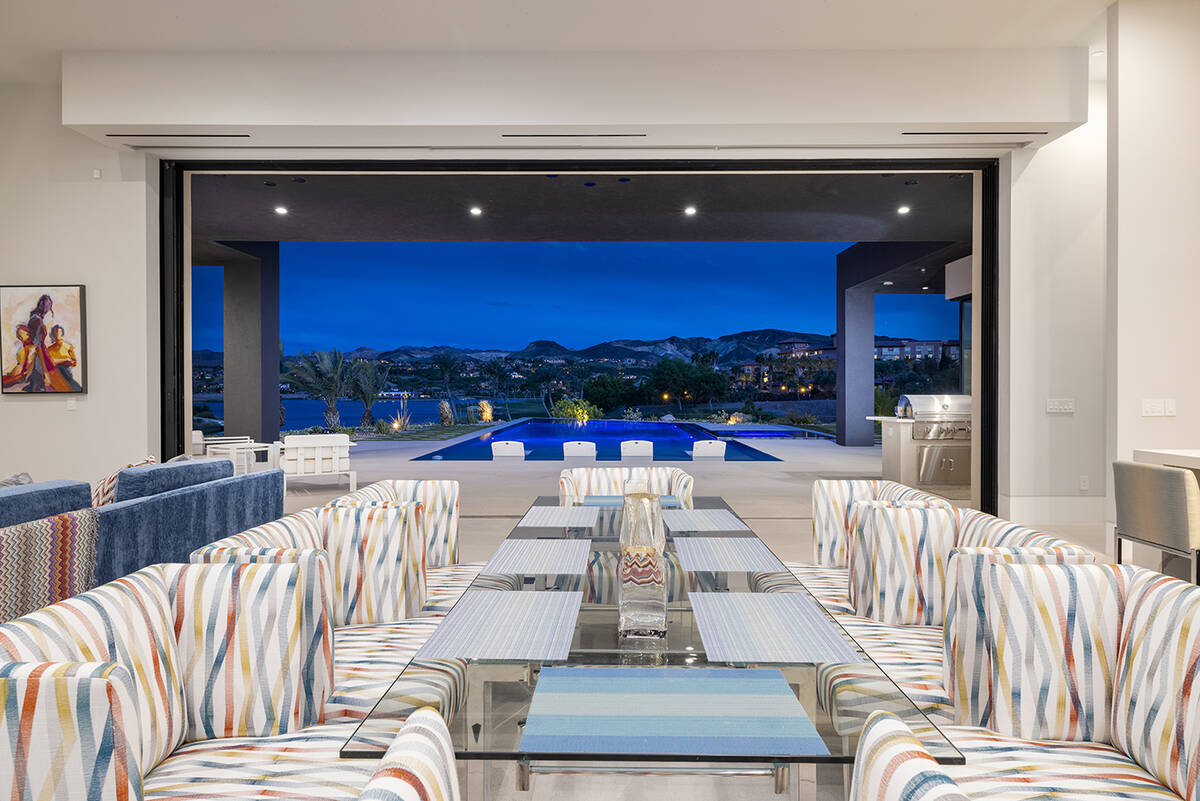 The kitchen area opens to the pool. (JPM Studios)