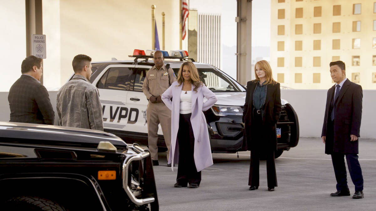Paula Newsome, Marg Helgenberger and Reggie Lee film a scene atop Circa's Garage Mahal for the ...