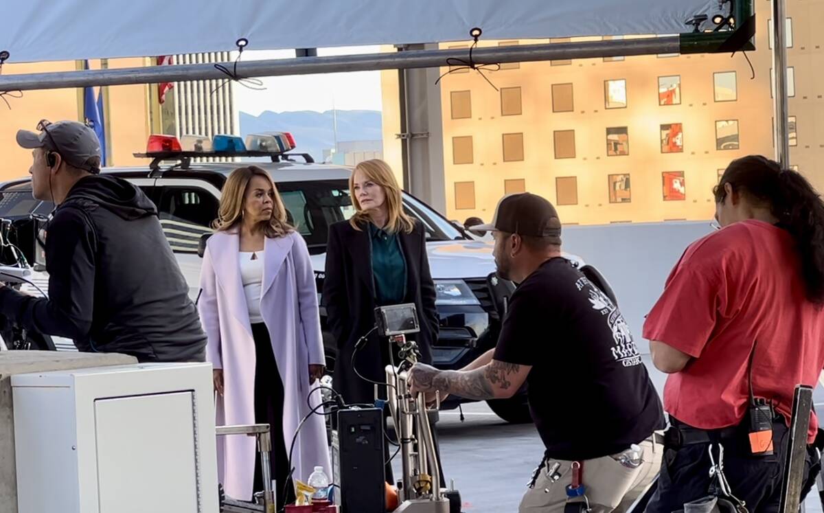 Paula Newsome, left, and Marg Helgenberger film a scene atop Circa's Garage Mahal for the "CSI: ...