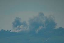 Smoke rises following an Israel military bombardment in southern Lebanon as seen from northern ...