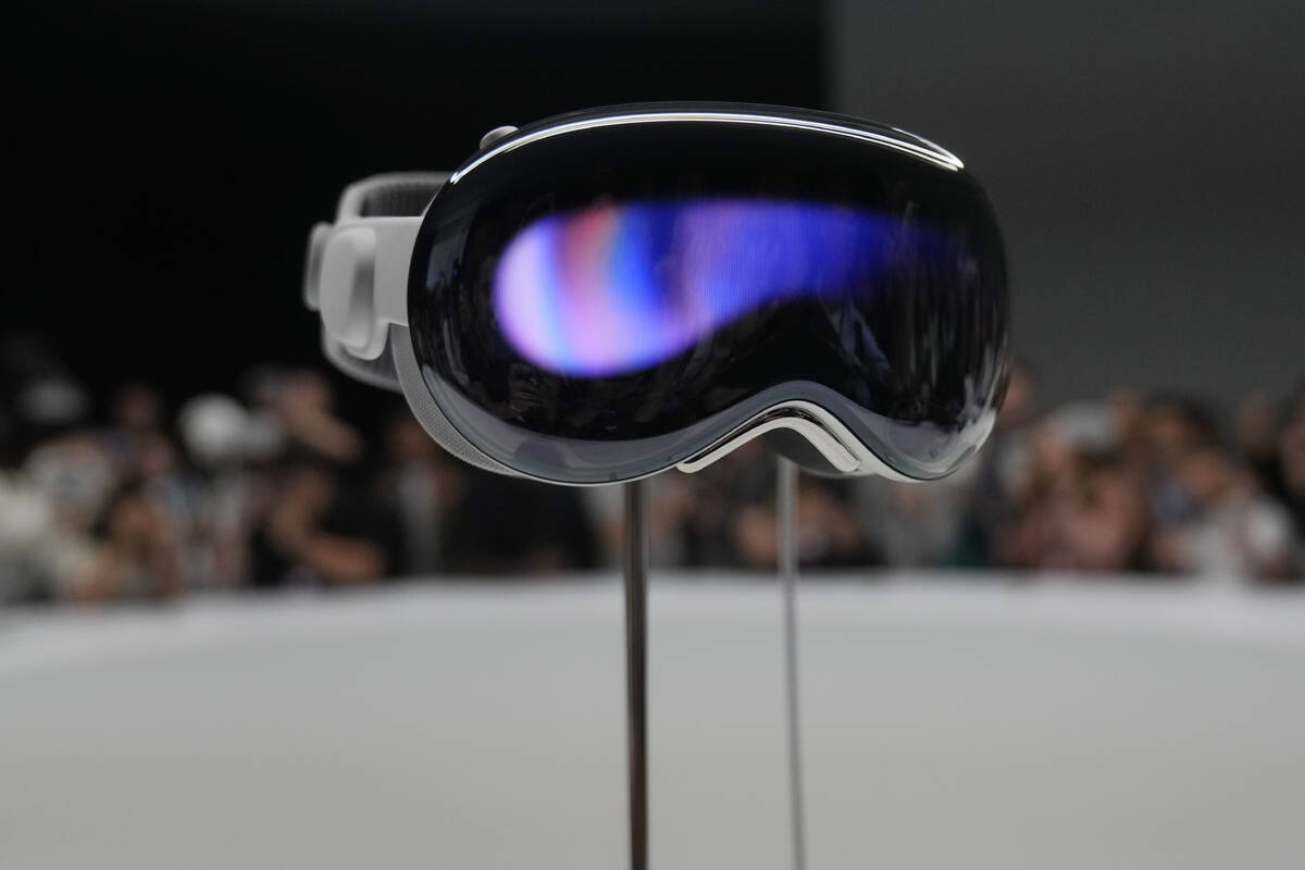 The Apple Vision Pro headset is displayed in a showroom on the Apple campus in Cupertino, Calif ...