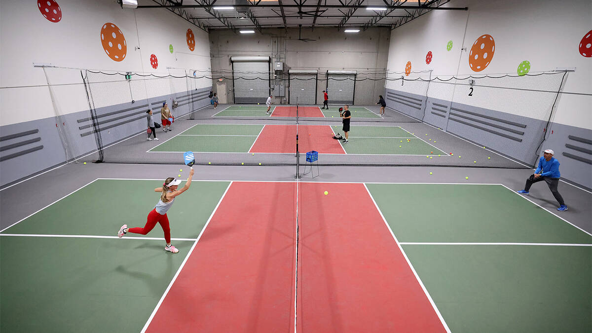 Darcy Shore, 16, plays against her fatherJosh Shore, 54, at Vegas Indoor Pickleball at 7575 W. ...