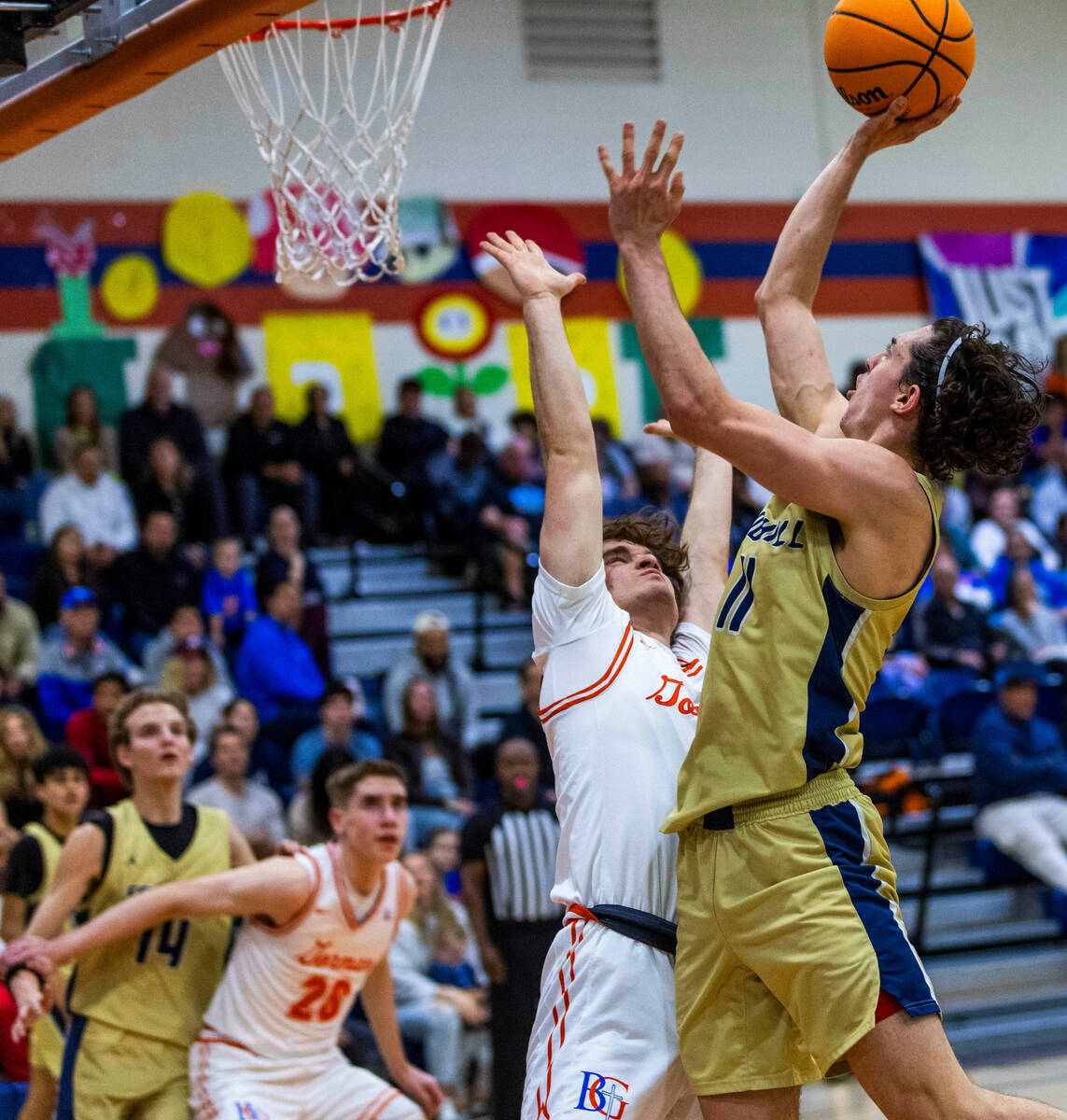 Bishop Gorman's Blake Sullivan (1) is unable to stop a drive to the net by Foothill's Zak Abdal ...