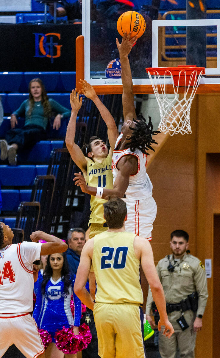 Bishop Gorman's Jett Washington (2) rejects a shot by Foothill's Zak Abdalla (11) during the se ...