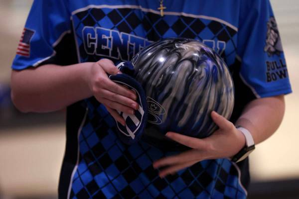 Centennial’s Sophie Wood prepares her ball before throwing during the Class 5A state bow ...