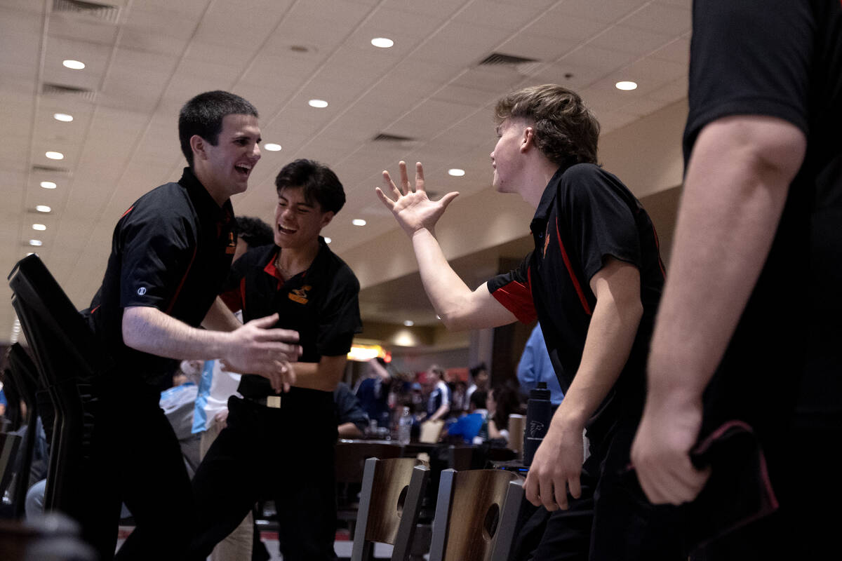 SECTA celebrates as they pull ahead of Foothill during the Class 4A state bowling championship ...