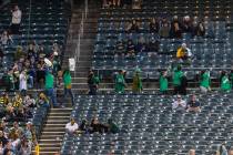 The Oakland A's fans protest at the Oakland Coliseum during a baseball game between the A&#x201 ...