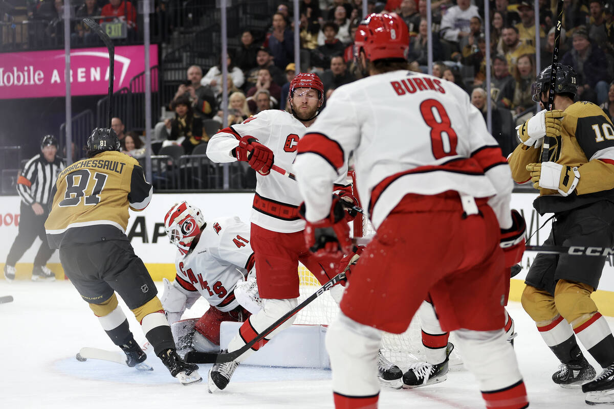 Golden Knights right wing Jonathan Marchessault (81) spots the puck before scoring on Hurricane ...