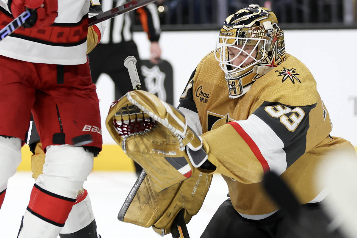 Golden Knights goaltender Adin Hill (33) prepares to make a glove save during the second period ...