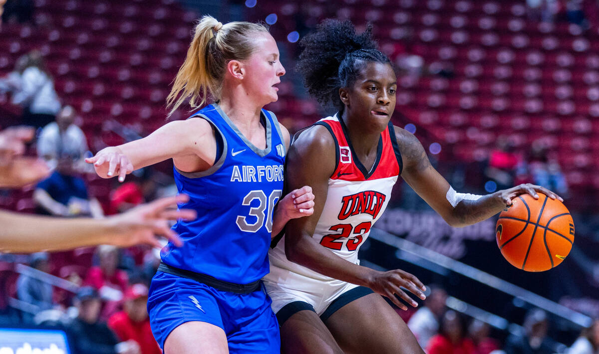 Air Force Falcons forward Dasha Macmillan (30) guards UNLV Lady Rebels center Desi-Rae Young (2 ...