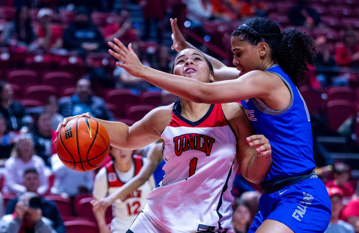 UNLV Lady Rebels forward Nneka Obiazor (1) looks to the basket as Air Force Falcons guard Jayda ...