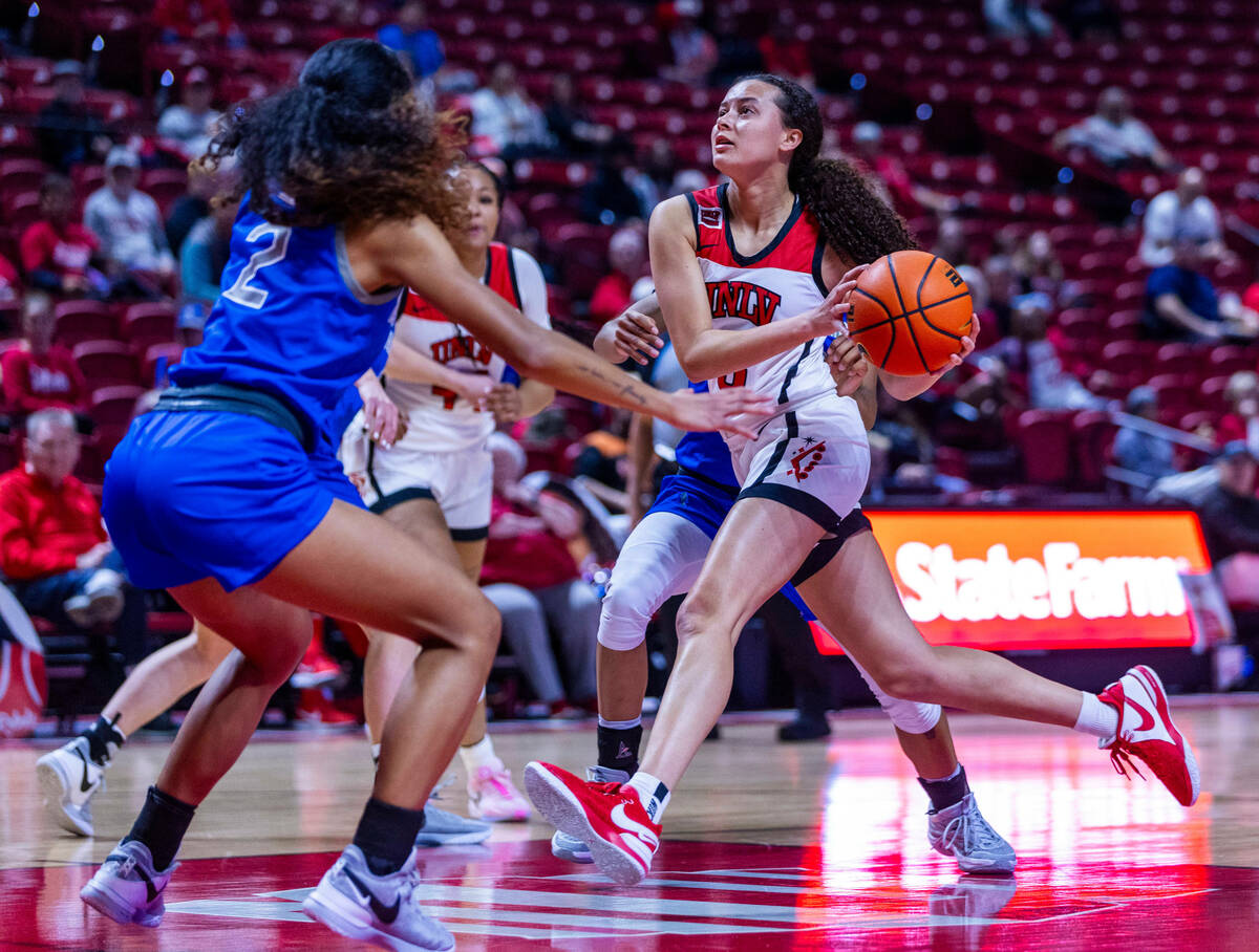UNLV Lady Rebels guard Kiara Jackson (3) drives the court as Air Force Falcons guard Milahnie P ...