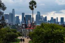 Low clouds gather over the Los Angeles skyline seen from Elysian Park on Sunday, Feb. 18, 2024. ...
