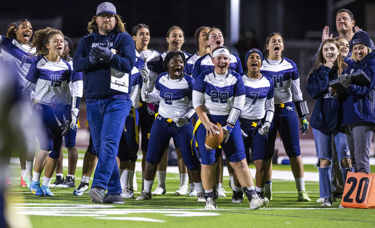 Shadow Ridge players celebrate another score against at Desert Oasis during the first half of t ...