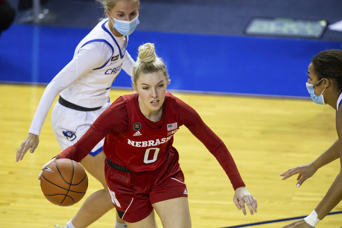 Nebraska guard Ashley Scoggin (0) dribbling the ball against Creighton during an NCAA college b ...