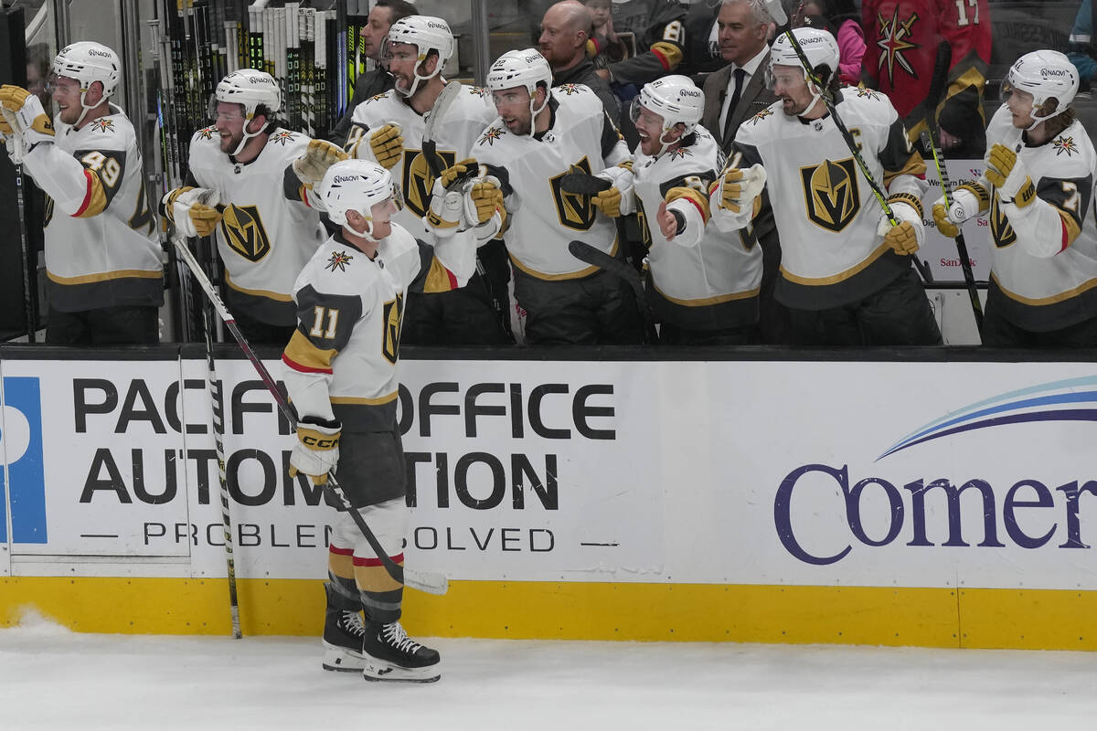Vegas Golden Knights left wing Mason Morelli (11) is congratulated by teammates after scoring a ...