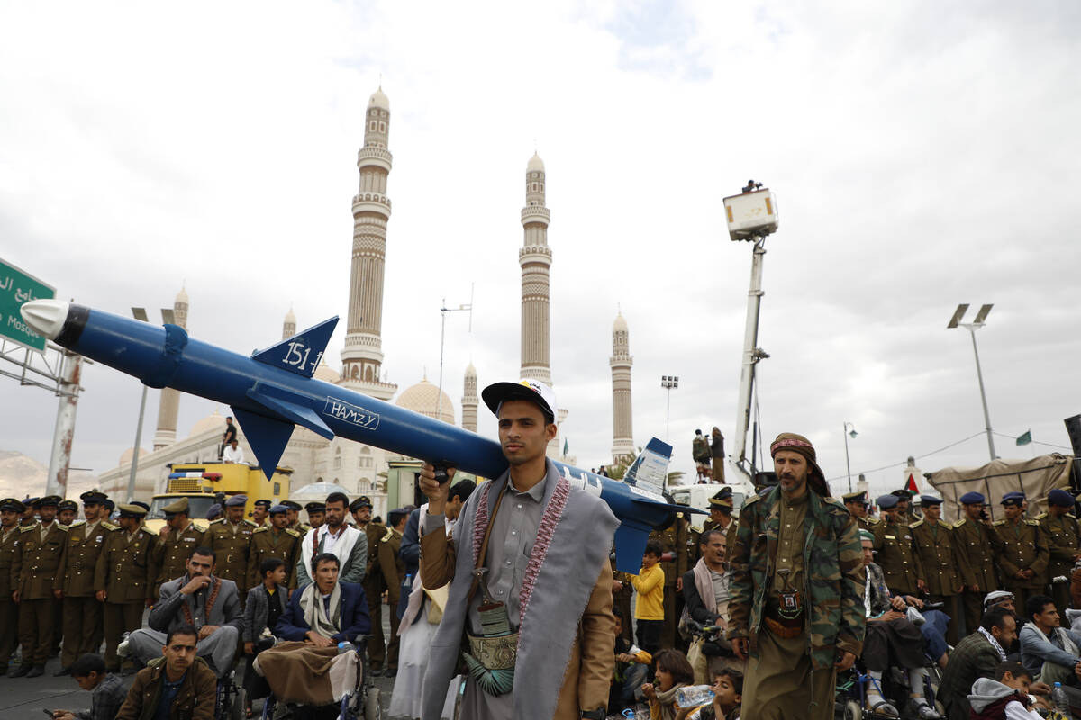 Houthi supporters attend a rally against the U.S.-led strikes against Yemen and in the support ...