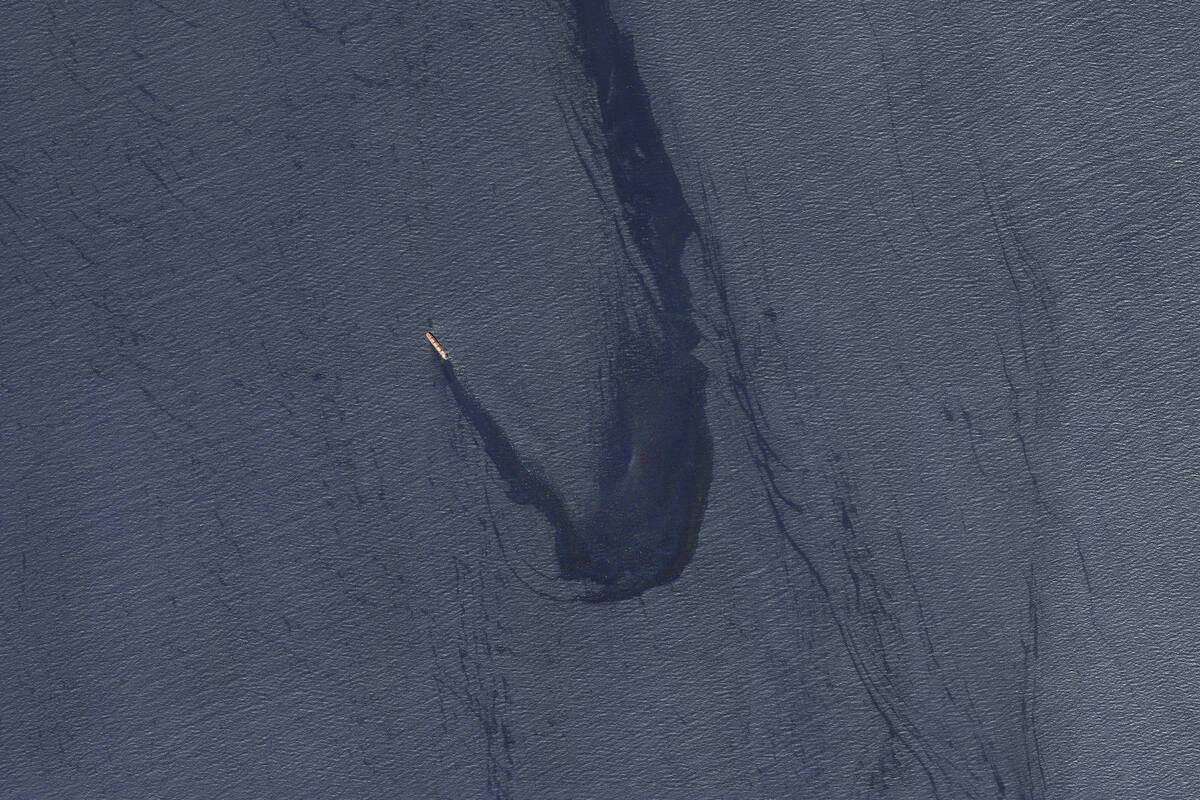 In this satellite image provided by Planet Labs, the Belize-flagged bulk carrier Rubymar is see ...