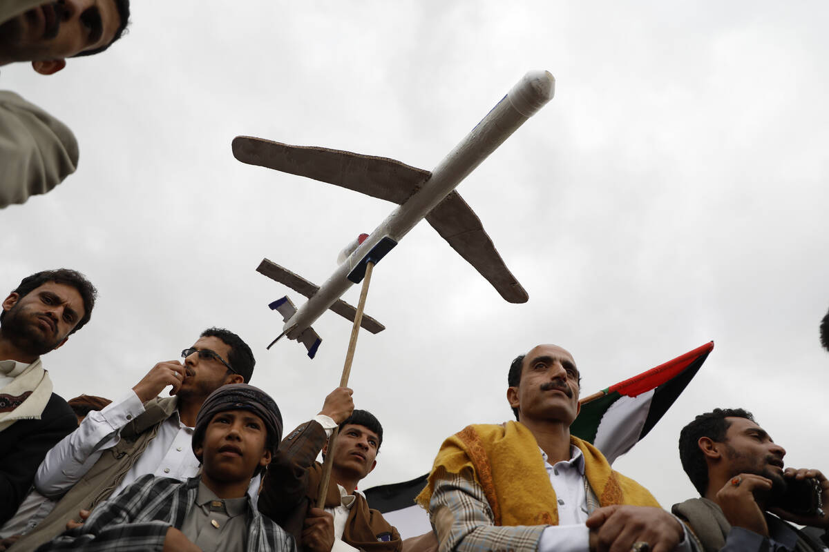 Houthi supporters attend a rally against the U.S.-led strikes against Yemen and in the support ...
