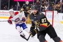 Golden Knights defenseman Shea Theodore (27) skates down the rink during an NHL game against th ...